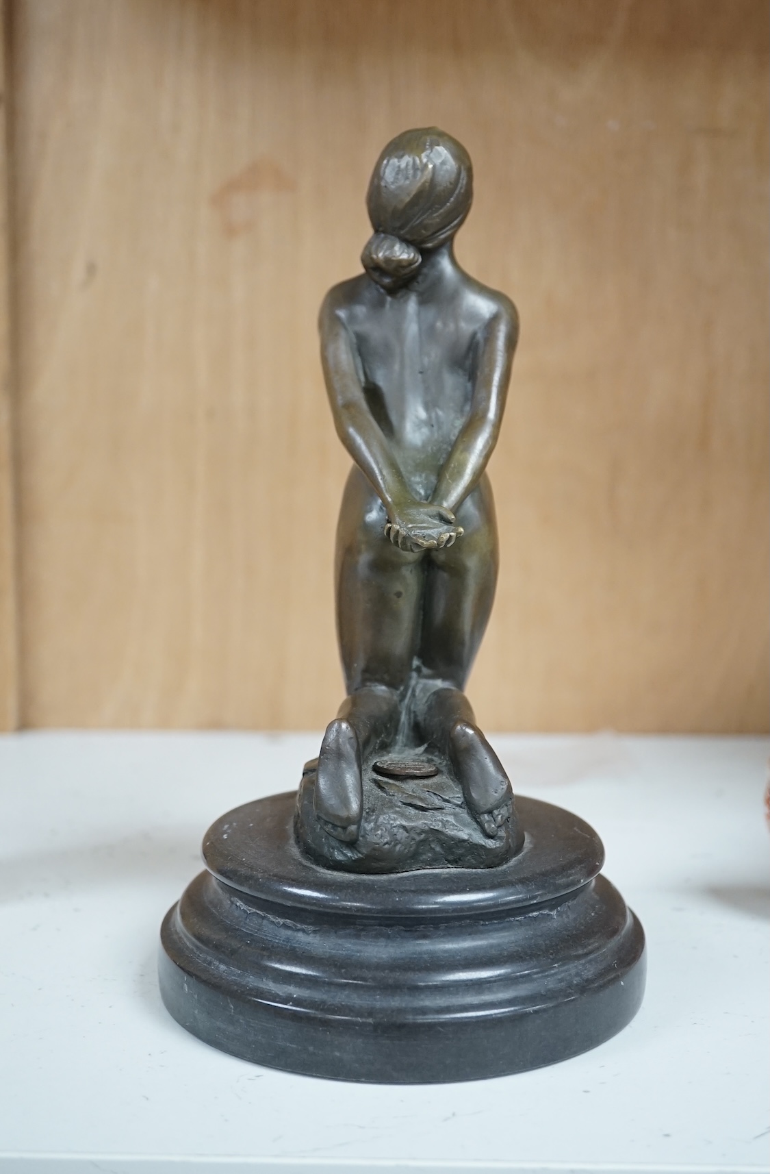 After Jean Patoue (1887 - 1936), a small bronze study of a bound nude lady, J.B. Deposse foundry mark, 21cm. Condition - base has crack around the entire diameter, possibly restored.